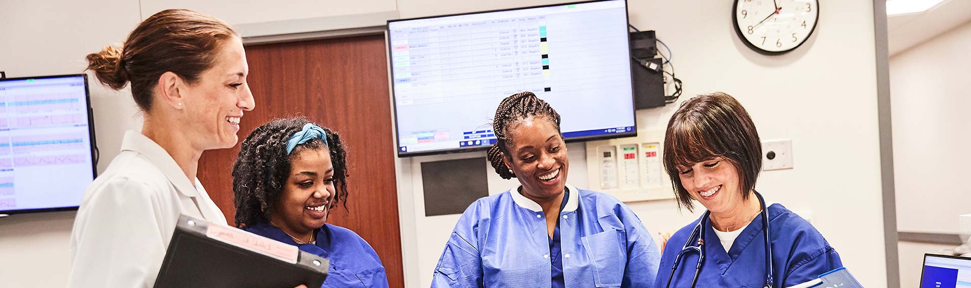 nurses and doctor chatting